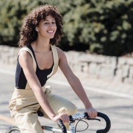 a woman riding a bike